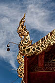 Chiang Mai - Wat Phra That Doi Suthep. Detail of the roof finial of the shrine to Sudeva. 